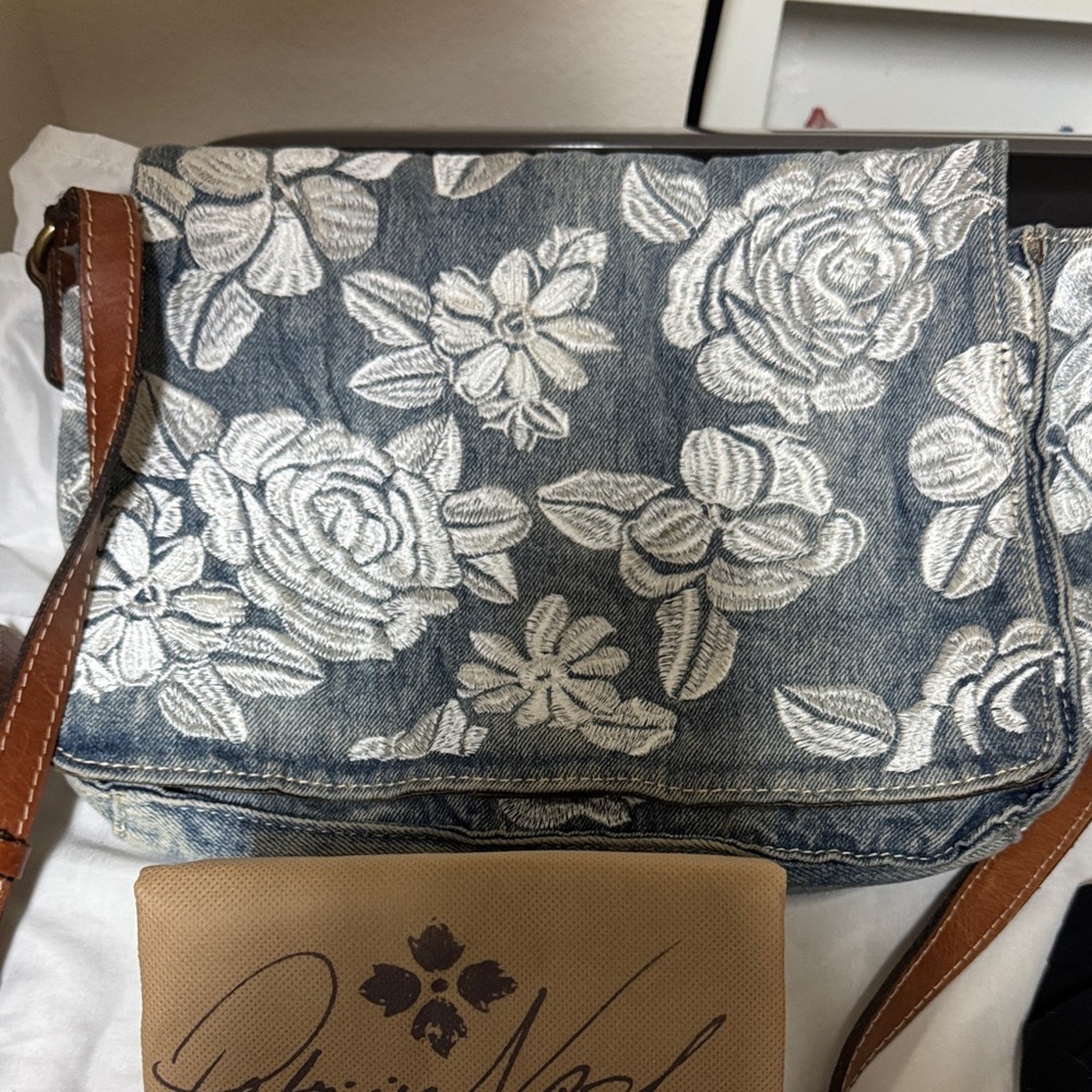 Patricia Nash Blue Denim Crossbody with White Floral Embroidery and Brown Strap
